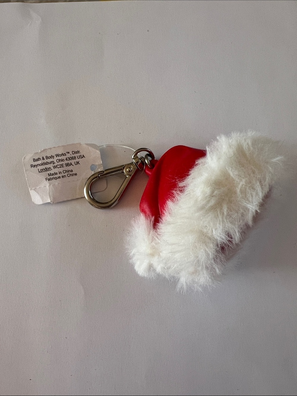 Bath & Body Works Red and Silver Holiday Hat Keychain anti bacterial hand gel.
